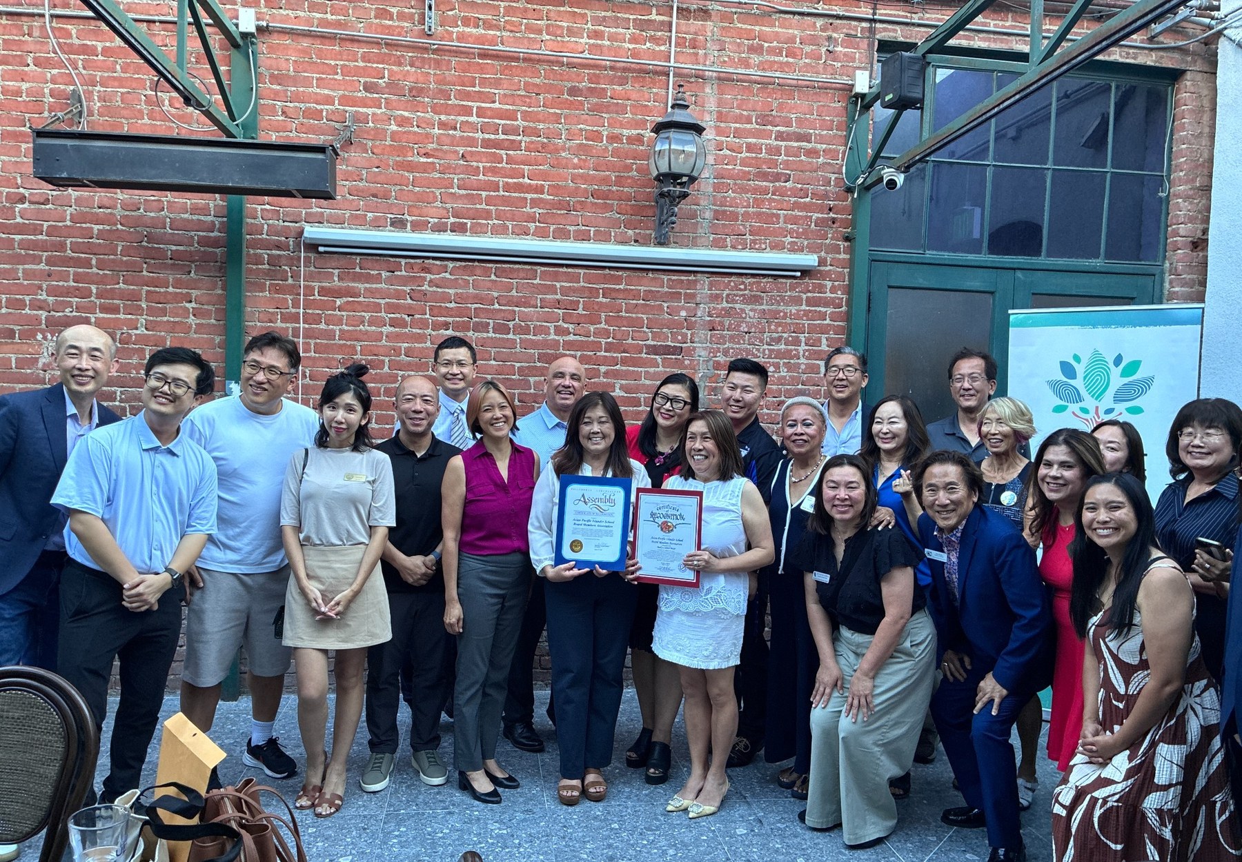 Community leaders and residents gathered for a local recognition event.