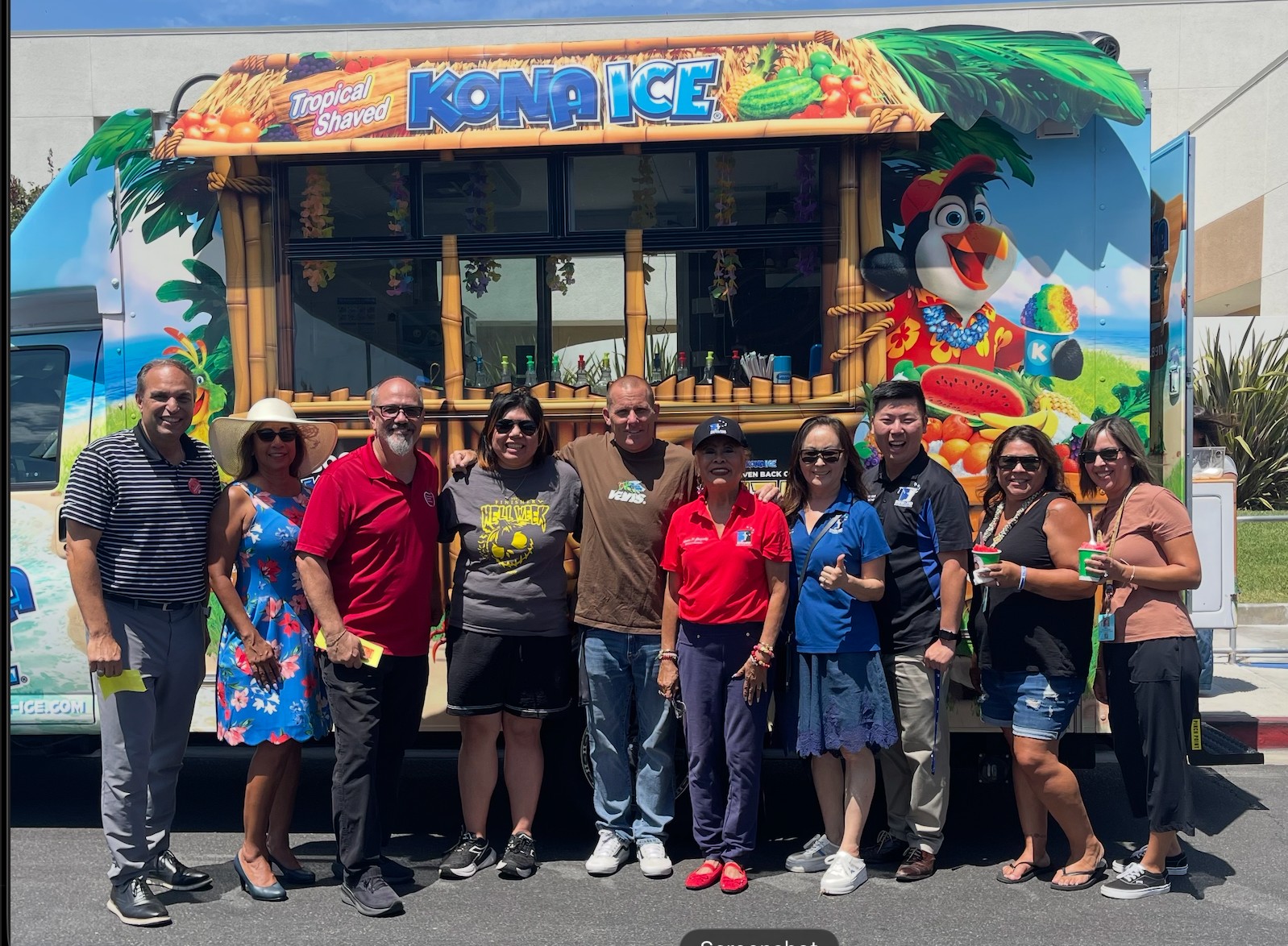 Agnes Gonzalez with community members at a local school community event.